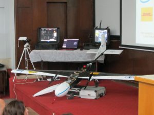 The aircraft and ground station exhibited on the auditorium stage