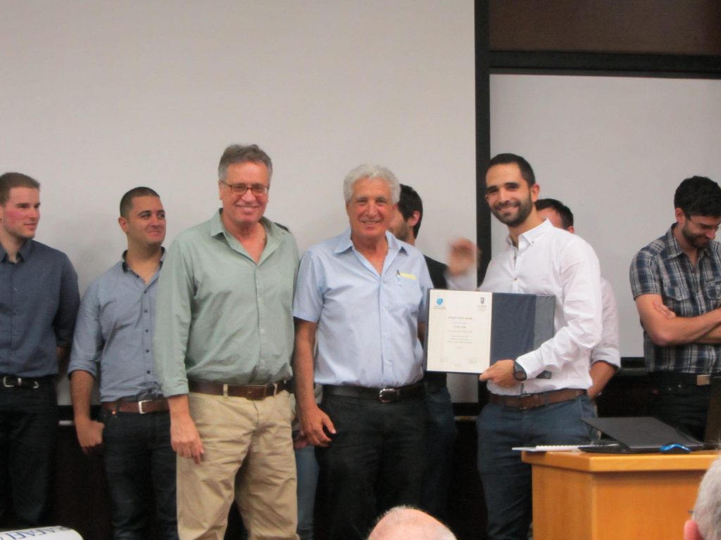 Eliran Eyal receiving a Certificate of Appreciation from Prof. Cohen and Dror Artzi