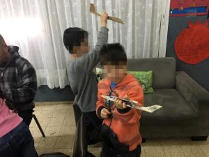 Flying airplane models at the “Imbar” after-school child care facility