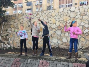 Flying airplane models at the “Imbar” after-school child care facility