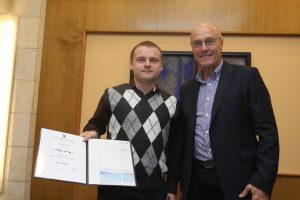 Ph.D. student Pavel Galich receiving the Hillel Prize
